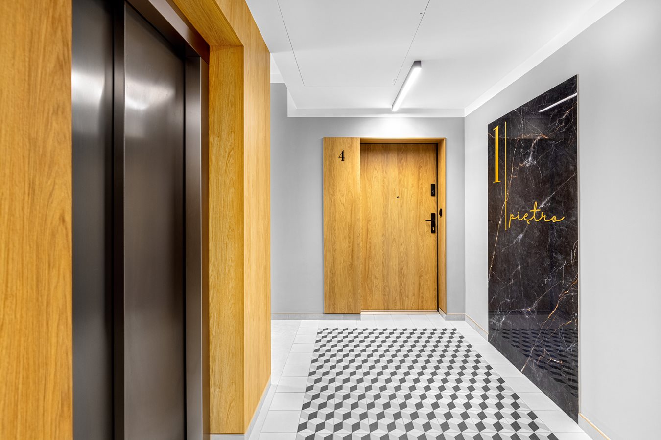 Apartamenty Ołtaszyn - Zdjęcie budynku pokazowego (wejście do mieszkania)